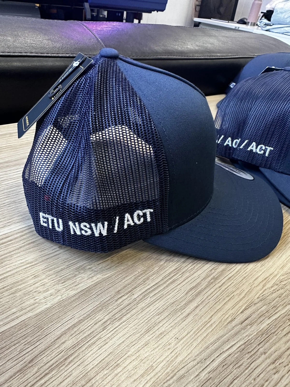 ETU Hats embroidered cap stack with clean lighting